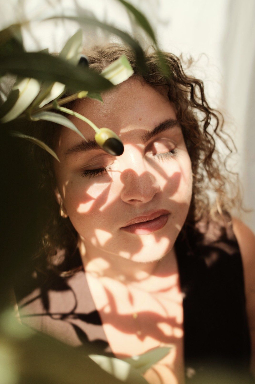 Franziska among olive leaves